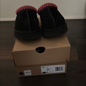 UGG Black Suede Slip-On Shoes with Red Trim